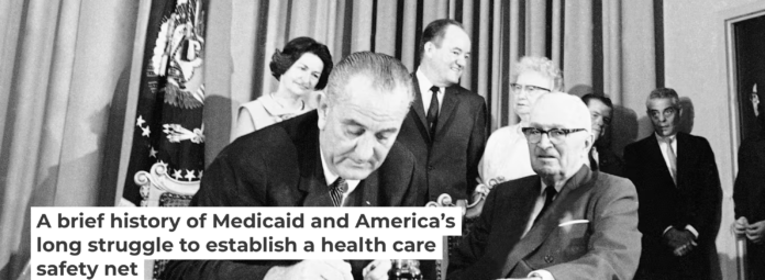 President Lyndon B. Johnson, left, next to former President Harry S. Truman, signs into law the measure creating Medicare and Medicaid in 1965. AP Photo President Lyndon B. Johnson, left, next to former President Harry S. Truman, signs into law the measure creating Medicare and Medicaid in 1965. AP Photo